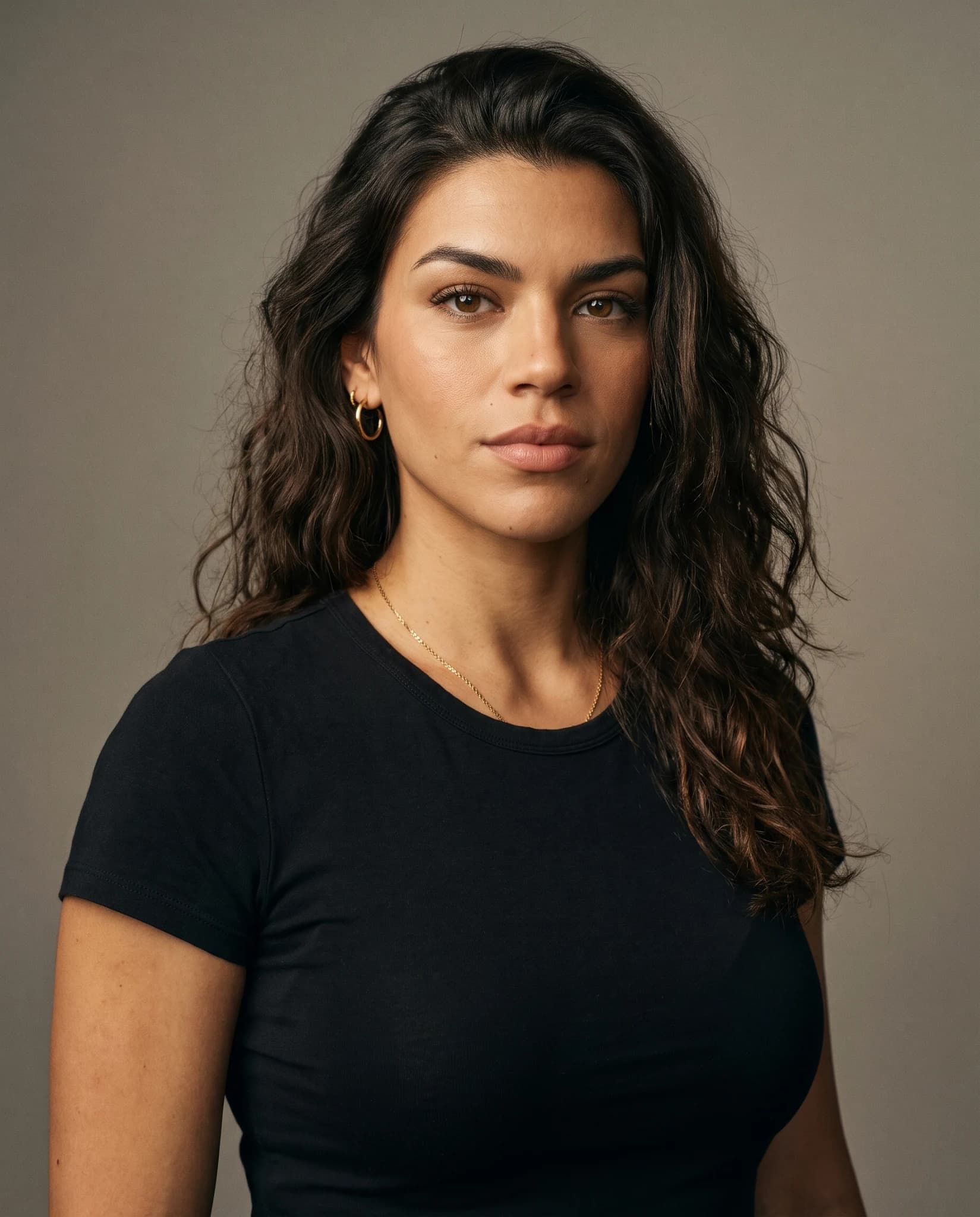 Portrait of Lucia wearing a black T-shirt